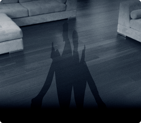 Shadowy figure representing harmful behaviour passed down.